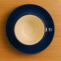 Blue Ceramic Cup with Saucer – Geometric Pattern