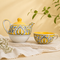 Athena Home Raksha Bandhan Gift Combo | Yellow Handpainted Ceramic Teapot with Cup Set, 2 Designer Rakhis | Premium Tea Gift Hamper