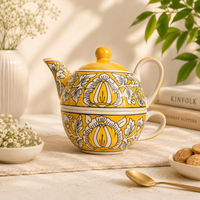 Athena Home Raksha Bandhan Gift Combo | Yellow Handpainted Ceramic Teapot with Cup Set, 2 Designer Rakhis | Premium Tea Gift Hamper